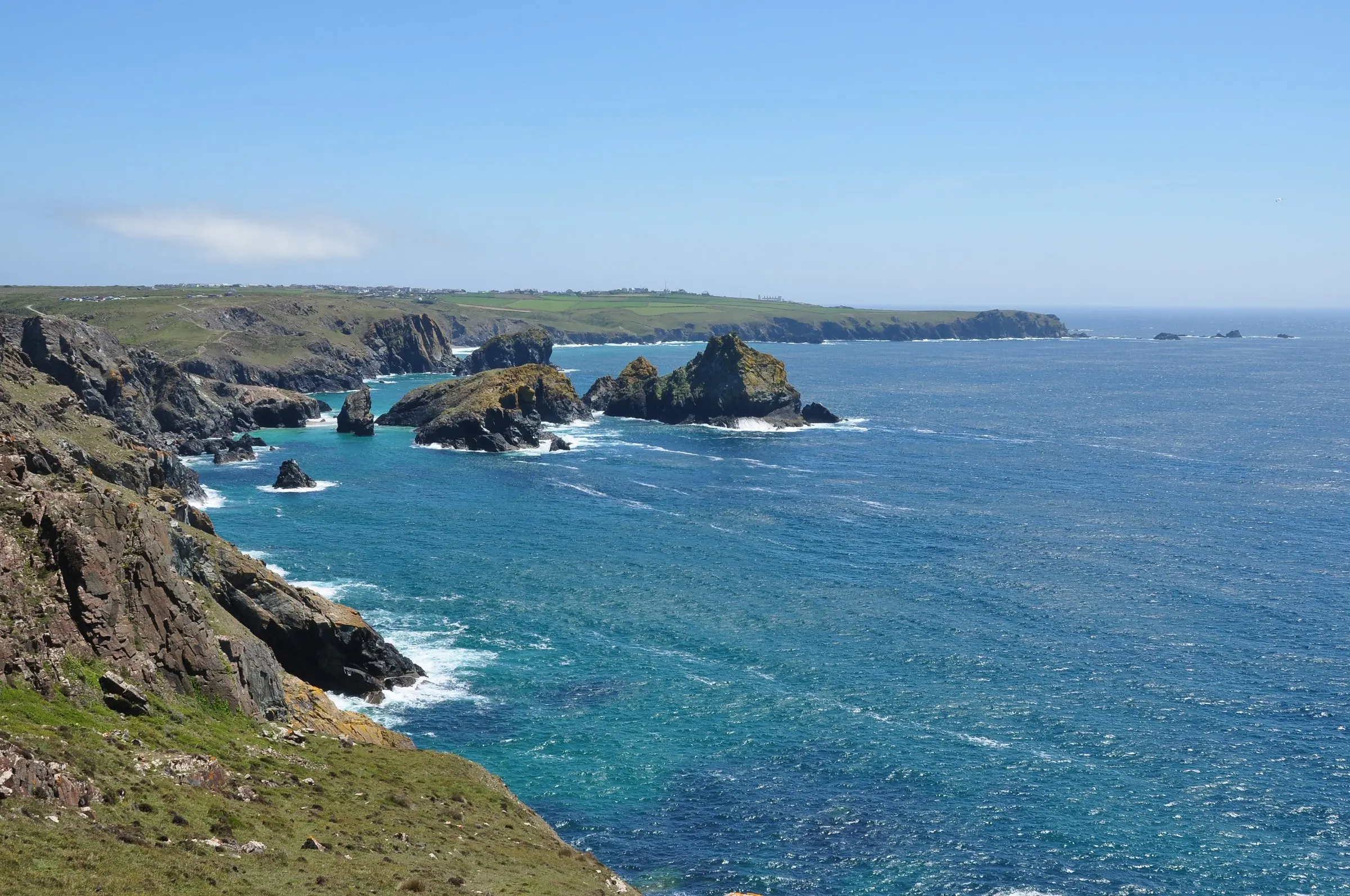 Kynance Cove — serpentine rock stacks and turquoise water on the Lizard Peninsula.