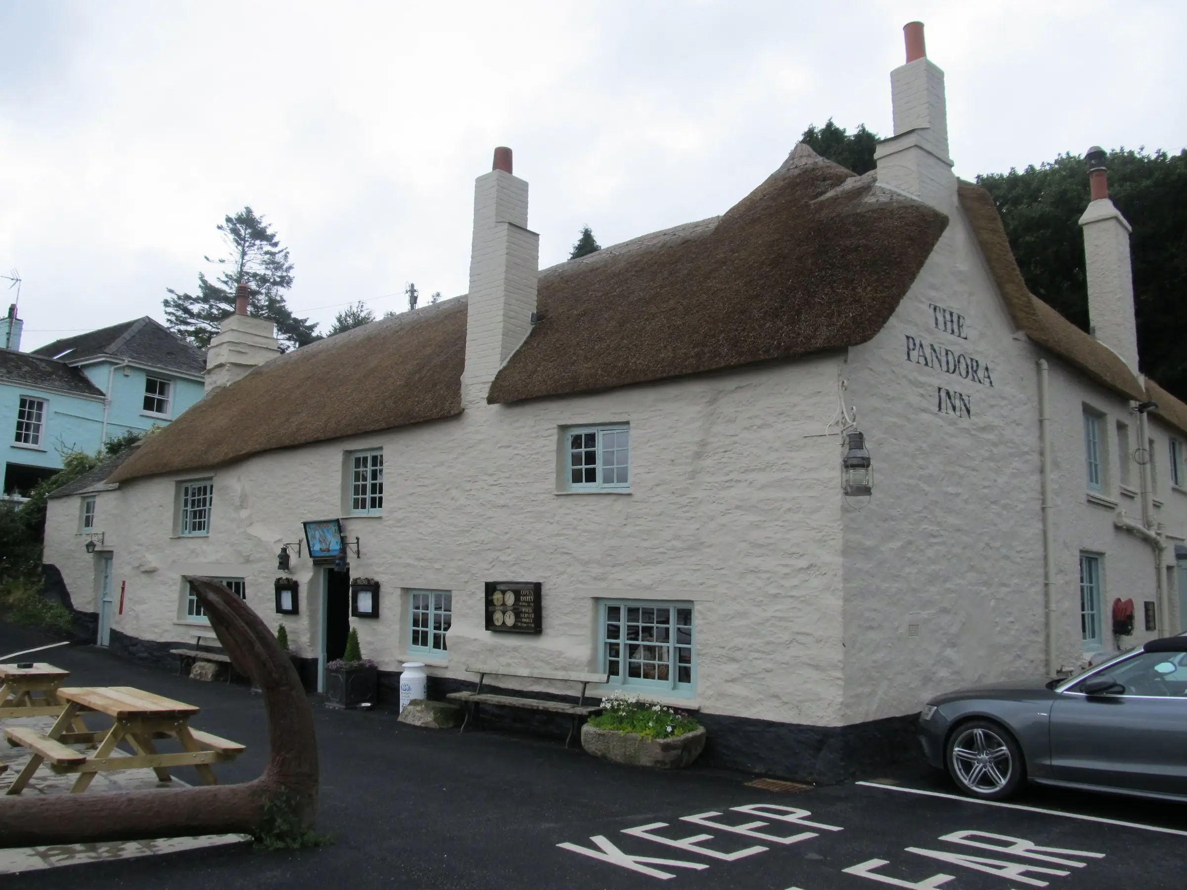 The Pandora Inn — thatched medieval pub on the edge of Restronguet Creek.